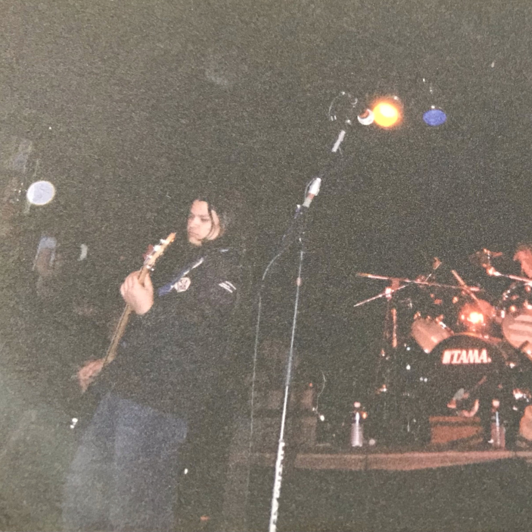 Vince Meneses playing bass in high school punk band